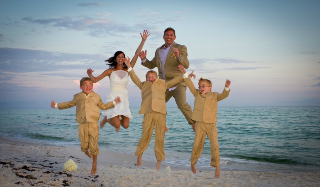 beach wedding jumping photo